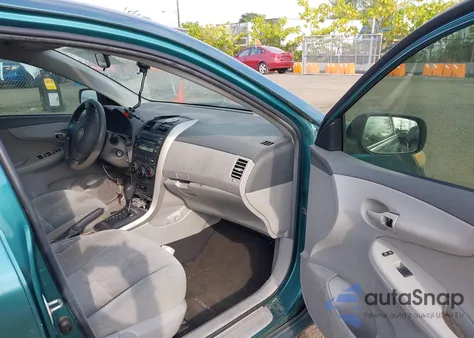 2009 Toyota Corolla Le from USA, damaged, VIN 1NXBU40EX9Z070929